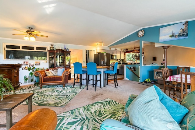 69 N Pt, Bellingham, WA 98229 - living area with light carpet, lofted ceiling, crown molding, and ceiling fan