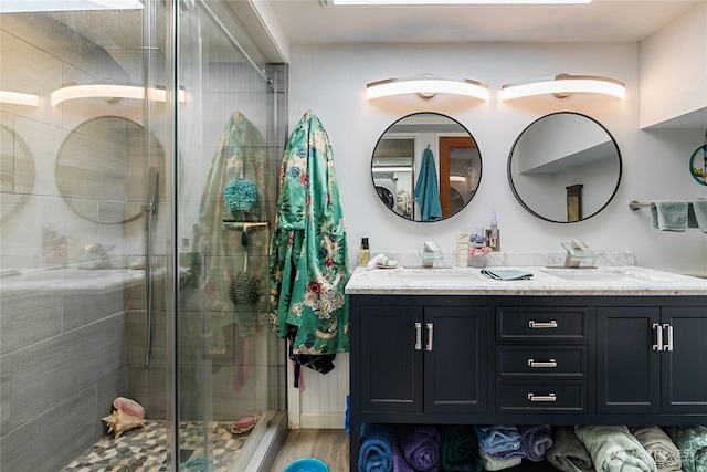 69 N Pt, Bellingham, WA 98229 - full bath with a sink, a shower stall, double vanity, and wood finished floors