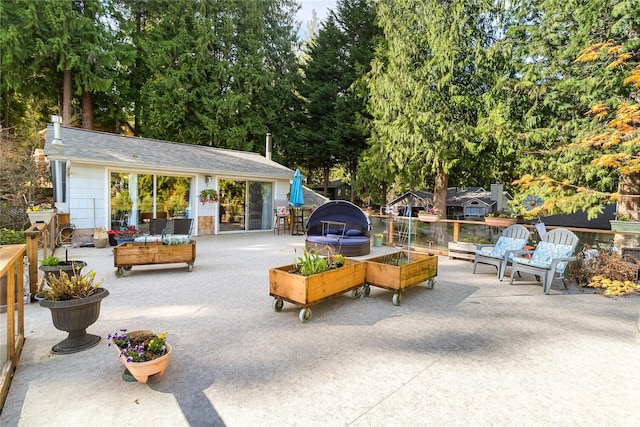 69 N Pt, Bellingham, WA 98229 - view of patio featuring a garden