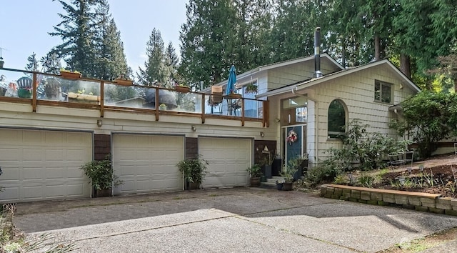 69 N Pt, Bellingham, WA 98229 - view of front of property featuring concrete driveway and a balcony