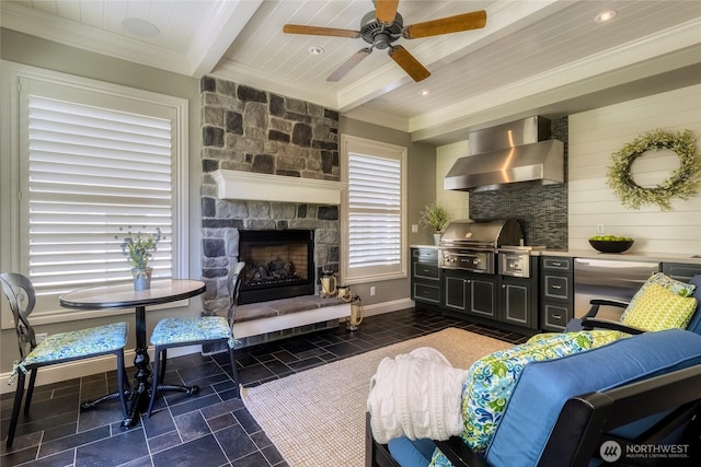 2001 Stillwater Dr, Walla Walla, WA 99362 - living area featuring stone tile flooring, ceiling fan, a fireplace, crown molding, and beamed ceiling
