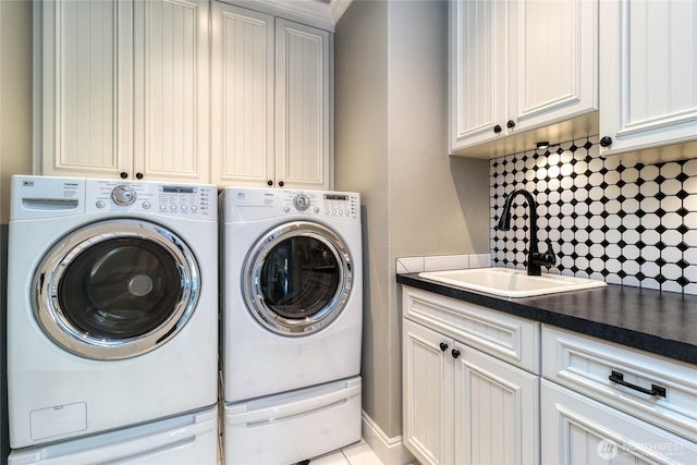 2001 Stillwater Dr, Walla Walla, WA 99362 - clothes washing area with washing machine and clothes dryer, a sink, and cabinet space