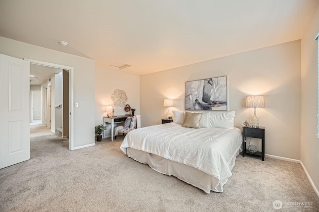 bedroom featuring carpet floors and baseboards