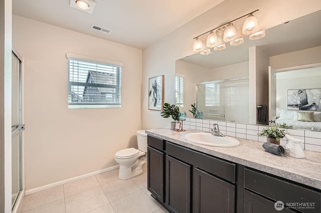 bathroom with toilet, tile patterned floors, baseboards, a shower stall, and visible vents