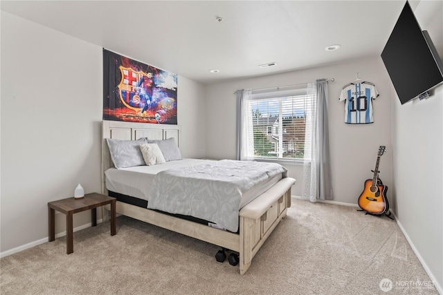 bedroom with visible vents, baseboards, recessed lighting, and light colored carpet
