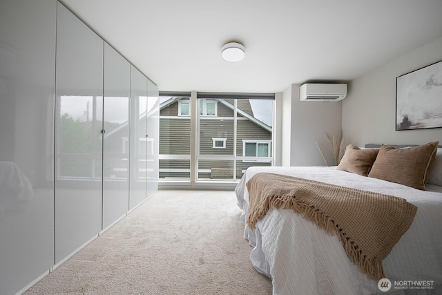 111 17th Ave Unit B, Seattle, WA 98112 - bedroom with carpet flooring, floor to ceiling windows, a wall unit AC, and access to exterior