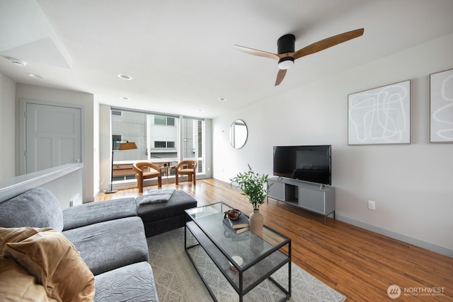 111 17th Ave Unit B, Seattle, WA 98112 - living area with a ceiling fan, baseboards, recessed lighting, and wood finished floors