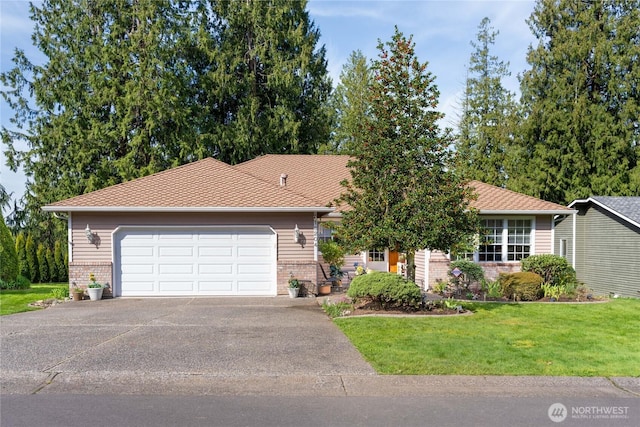 ranch-style home featuring aphalt driveway, an attached garage, and a front lawn
