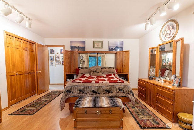bedroom featuring light wood-style floors