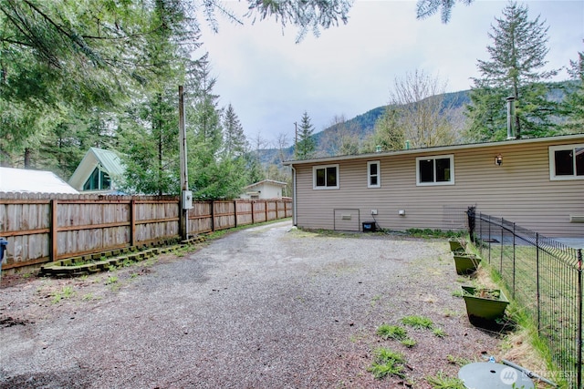 8095 Mosey Ct, Maple Falls, WA 98266 - back of house with a mountain view and fence private yard