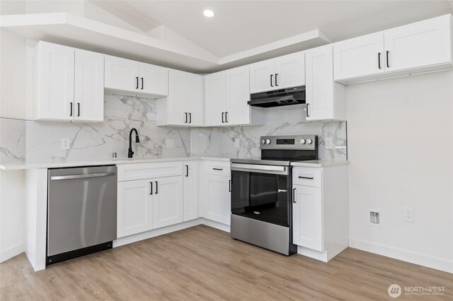1420 S 359th St, Federal Way, WA 98003 - kitchen featuring under cabinet range hood, light countertops, and appliances with stainless steel finishes