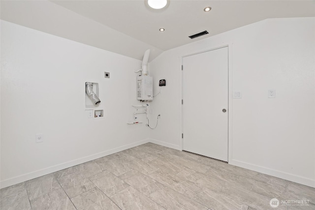 empty room featuring water heater, baseboards, vaulted ceiling, and recessed lighting