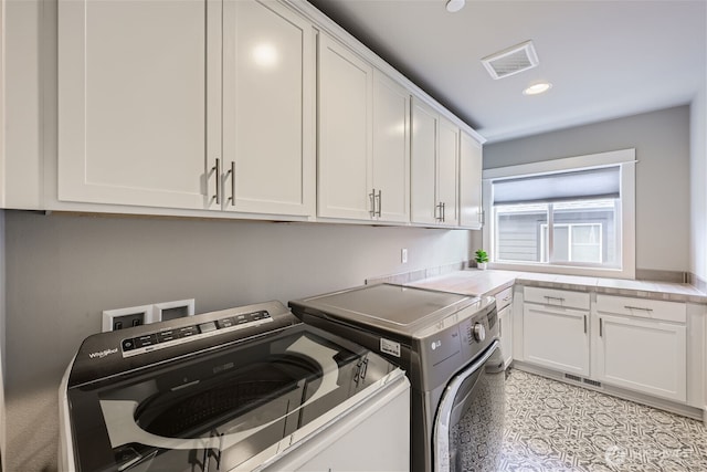 16216 81st Pl NE, Kenmore, WA 98028 - washroom with independent washer and dryer, cabinet space, and recessed lighting