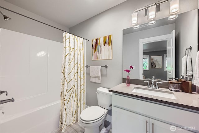 16216 81st Pl NE, Kenmore, WA 98028 - bathroom with toilet, vanity, and shower / bath combo with shower curtain