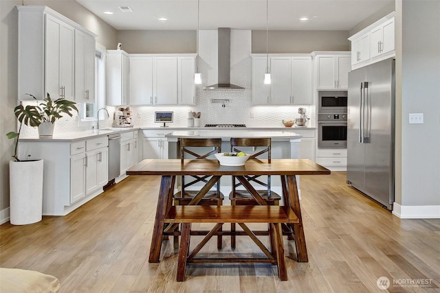 16216 81st Pl NE, Kenmore, WA 98028 - kitchen with appliances with stainless steel finishes, wall chimney exhaust hood, a sink, tasteful backsplash, and recessed lighting