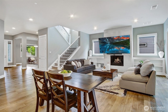 16216 81st Pl NE, Kenmore, WA 98028 - living room featuring light wood-style floors, stairway, recessed lighting, and baseboards