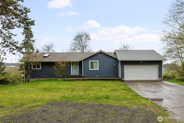 9365 Central Valley Rd NE, Bremerton, WA 98311 - view of front of property with an attached garage, a chimney, concrete driveway, and a front yard