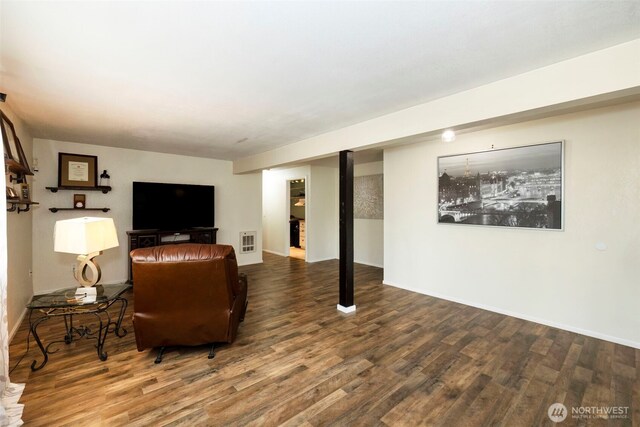 9365 Central Valley Rd NE, Bremerton, WA 98311 - living area featuring baseboards and wood finished floors