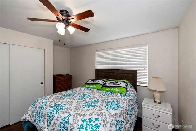9365 Central Valley Rd NE, Bremerton, WA 98311 - bedroom with a closet, ceiling fan, and dark wood-style floors