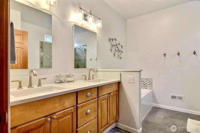 1921 NE Haven Way, Tahuya, WA 98588 - full bath with double vanity, visible vents, baseboards, and a sink
