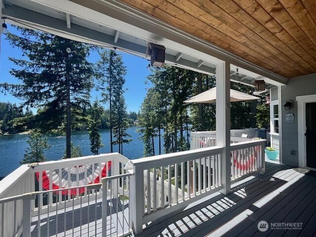 1921 NE Haven Way, Tahuya, WA 98588 - wooden terrace with a water view