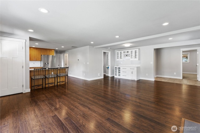 22115 103rd Pl SE, Kent, WA 98031 - unfurnished living room with recessed lighting and wood finished floors