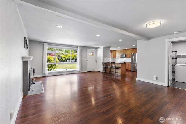 22115 103rd Pl SE, Kent, WA 98031 - unfurnished living room with dark wood-type flooring, recessed lighting, and a fireplace