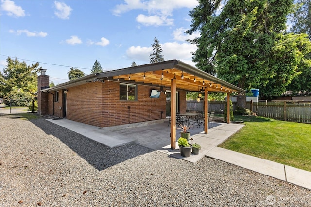 22115 103rd Pl SE, Kent, WA 98031 - rear view of house featuring a patio area, a chimney, and brick siding