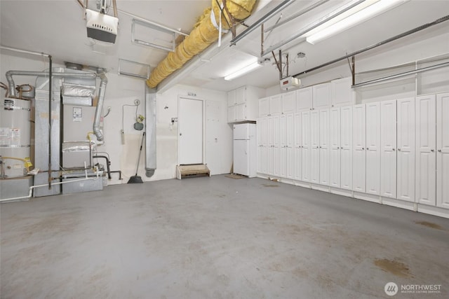 14026 SE 238th Ln, Kent, WA 98042 - garage featuring heating unit, secured water heater, and a garage door opener