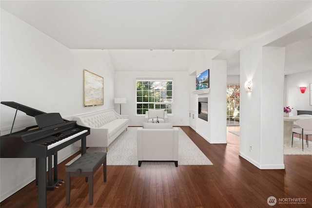 14026 SE 238th Ln, Kent, WA 98042 - living area featuring baseboards, a glass covered fireplace, and wood finished floors