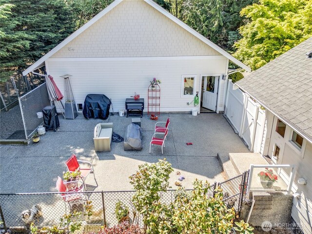 124 Hoods View Ct, Port Ludlow, WA 98365 - view of home's exterior featuring fence and a patio