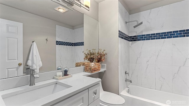 bathroom with vanity, toilet, and shower / washtub combination