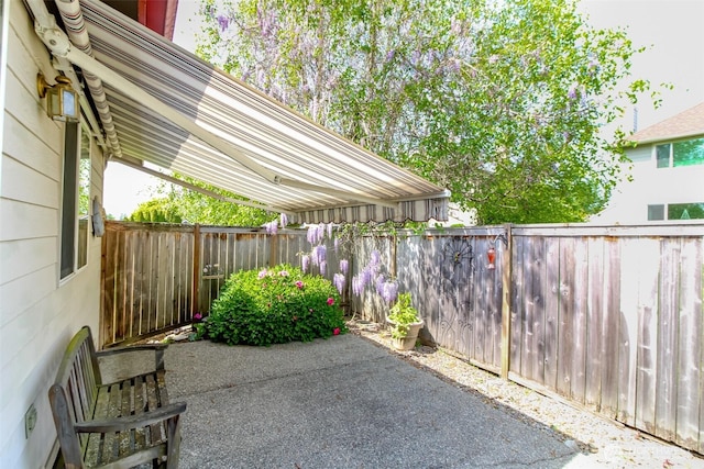 view of patio with a fenced backyard