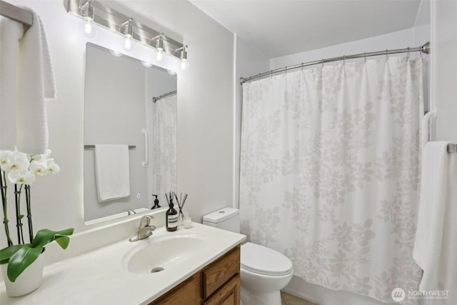 full bathroom with toilet, a shower with shower curtain, and vanity