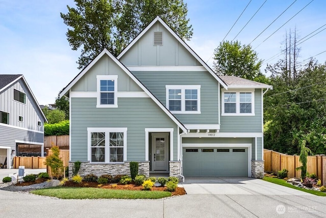 19512 81st Pl NE Unit 4, Kenmore, WA 98028 - craftsman-style house featuring board and batten siding, stone siding, a garage, and driveway