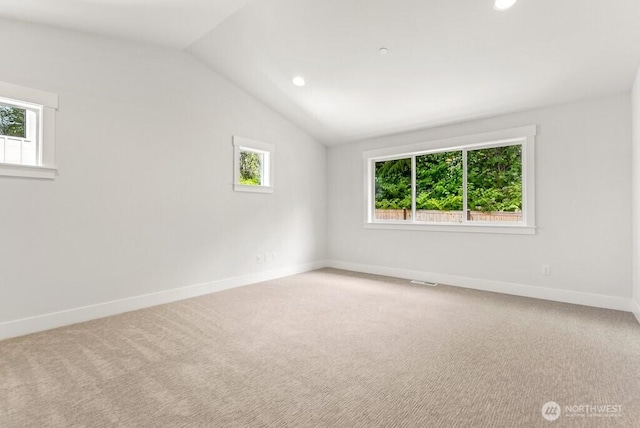 19512 81st Pl NE Unit 4, Kenmore, WA 98028 - empty room with lofted ceiling, carpet, and recessed lighting