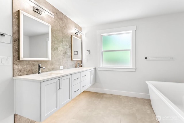 19512 81st Pl NE Unit 4, Kenmore, WA 98028 - full bath featuring a freestanding tub, double vanity, and backsplash