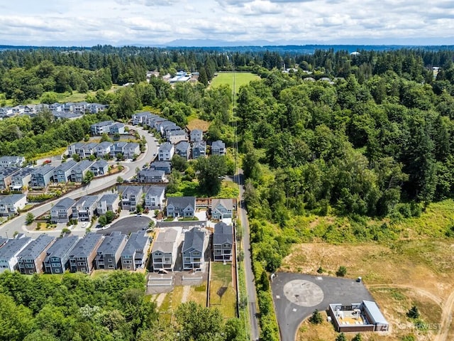 19512 81st Pl NE Unit 4, Kenmore, WA 98028 - aerial perspective of suburban area with a heavily wooded area