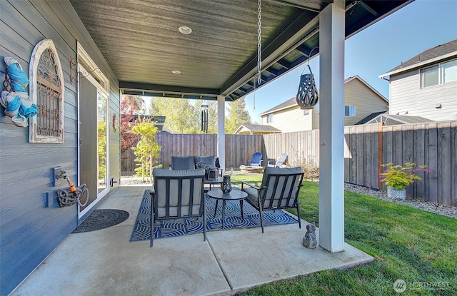 view of patio / terrace featuring outdoor lounge area and a fenced backyard