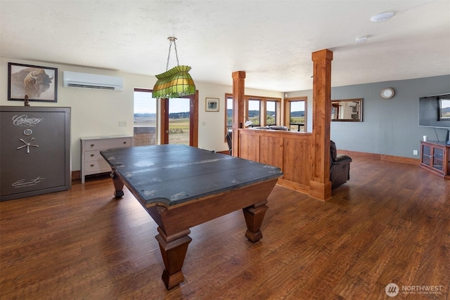 142 Pemberton Pl, Friday Harbor, WA 98250 - playroom featuring billiards, baseboards, an AC wall unit, ornate columns, and wood finished floors