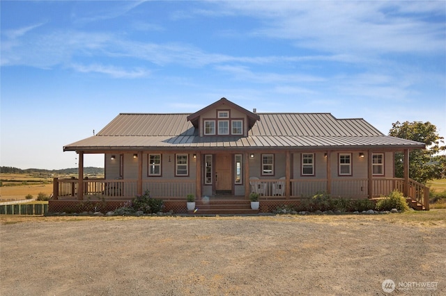 142 Pemberton Pl, Friday Harbor, WA 98250 - view of front of home with a porch and metal roof