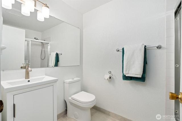 full bathroom with toilet, a stall shower, and vanity