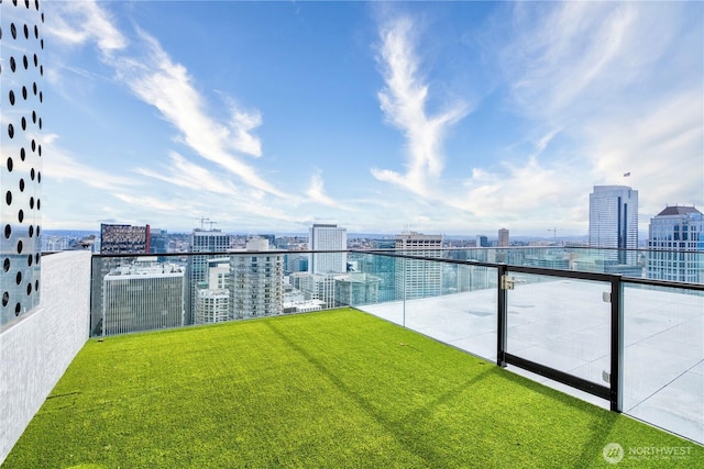 300 Virginia St Unit 1710, Seattle, WA 98101 - view of swimming pool featuring a view of city and a lawn