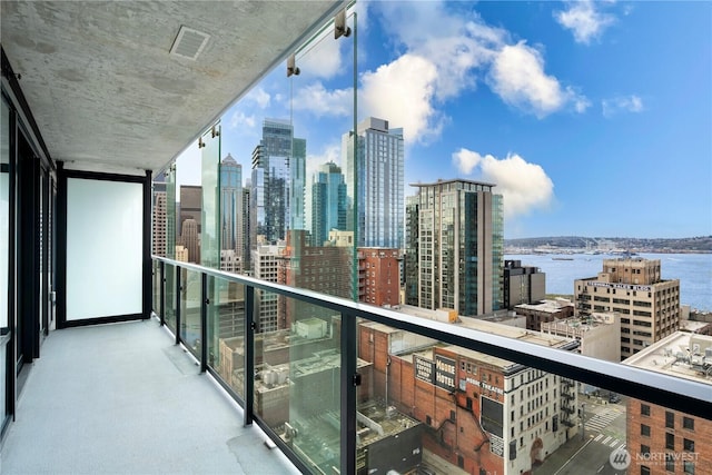 300 Virginia St Unit 1710, Seattle, WA 98101 - balcony featuring a water view, a view of city, and visible vents