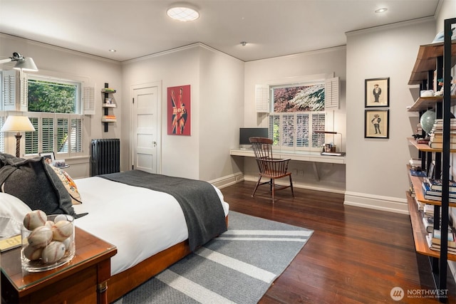 bedroom with baseboards, wood finished floors, recessed lighting, and crown molding