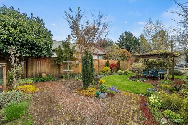 view of yard featuring a fenced backyard, a gazebo, and a patio