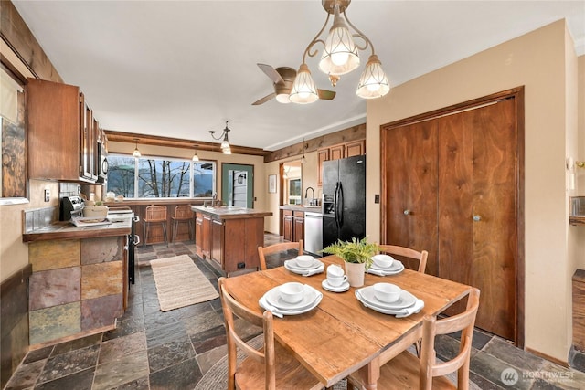 1016 Coronado Ave, Bellingham, WA 98229 - dining space featuring stone tile floors and ceiling fan