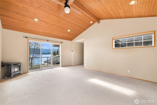 1016 Coronado Ave, Bellingham, WA 98229 - unfurnished living room with carpet flooring, ceiling fan, a water view, wooden ceiling, and vaulted ceiling with beams