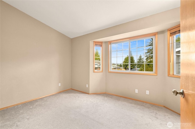 1016 Coronado Ave, Bellingham, WA 98229 - empty room featuring baseboards, a healthy amount of sunlight, and carpet flooring