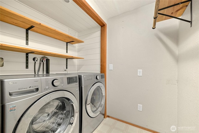 1016 Coronado Ave, Bellingham, WA 98229 - washroom with washer and clothes dryer, baseboards, light floors, and laundry area